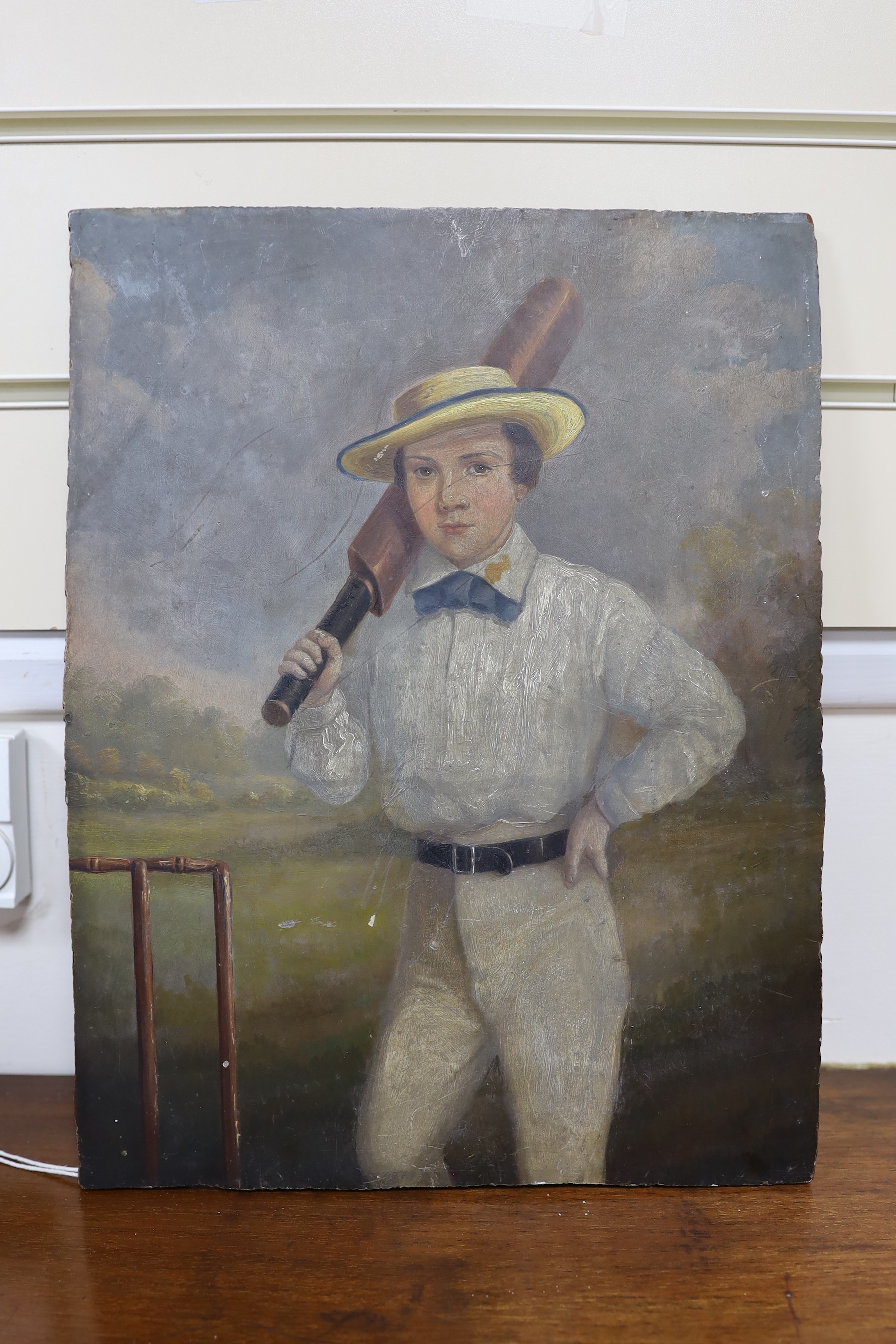 English School, mid 19th century, oil on panel, a young cricketer, unframed, 37x29cm